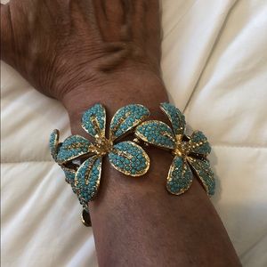 Faux turquoise and gold tone stretch bracelet.